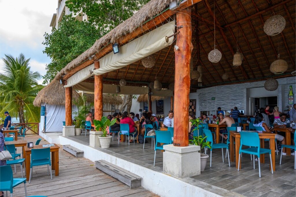 People eating at a restaurant in Cozumel
