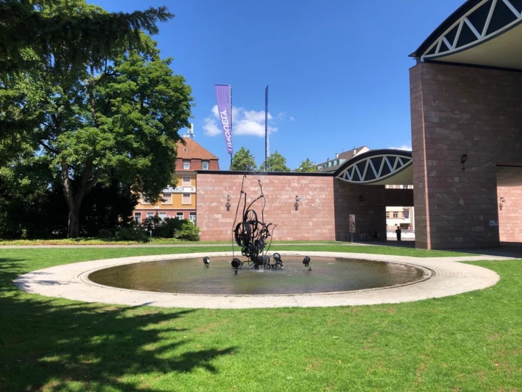 Exterior of Tinguely Museum with fountain