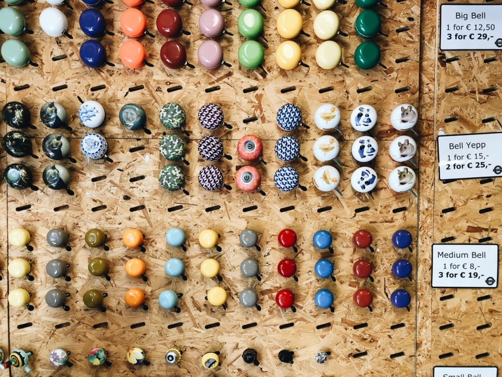 Colorful bicycle bells as Amsterdam souvenirs