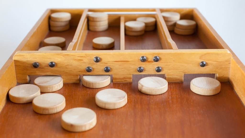 Traditional Dutch sjoelen shuffleboard game