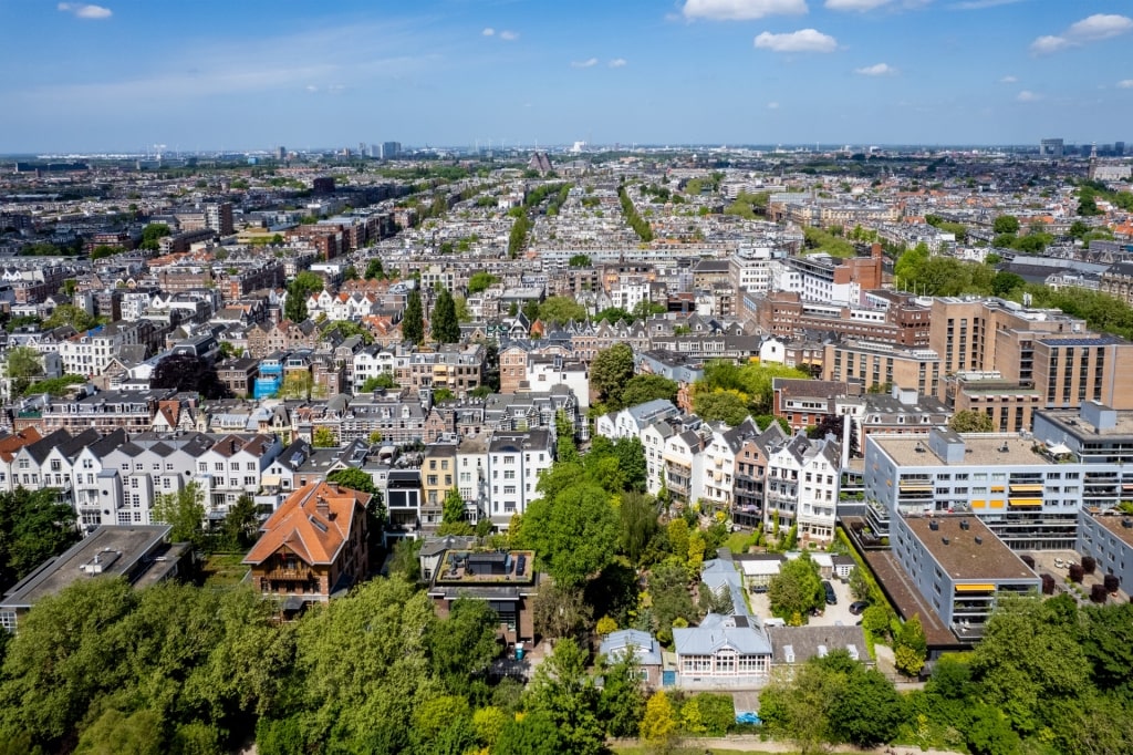 Panoramic Amsterdam cityscape with iconic architecture
