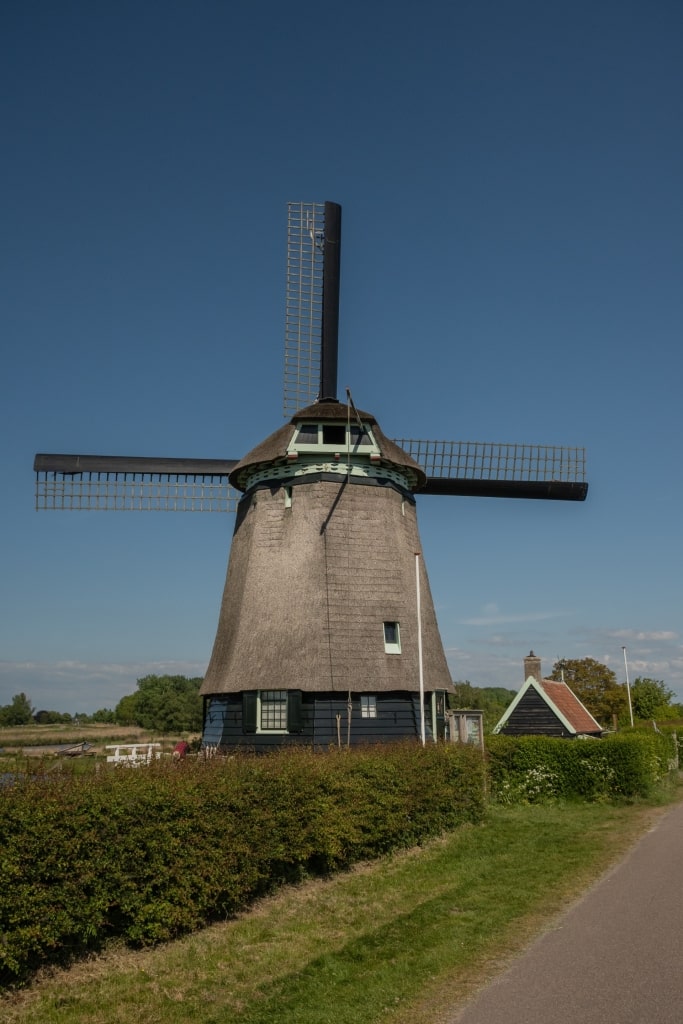 Traditional Amsterdam windmill Twiskemolen amid farmland