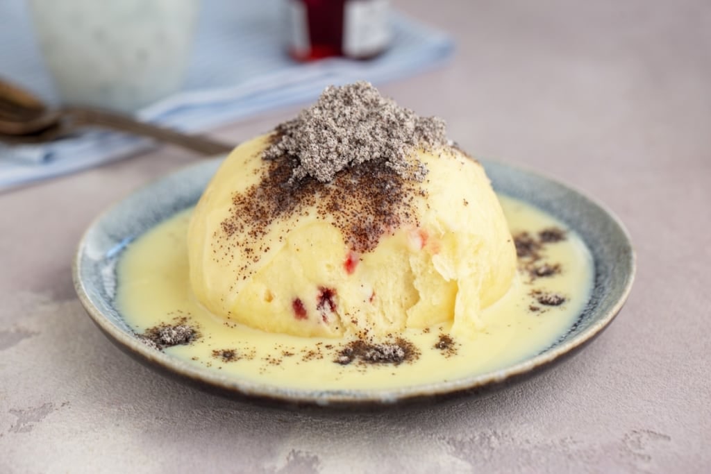 Austrian dessert Germknödel with thick plum jam filling