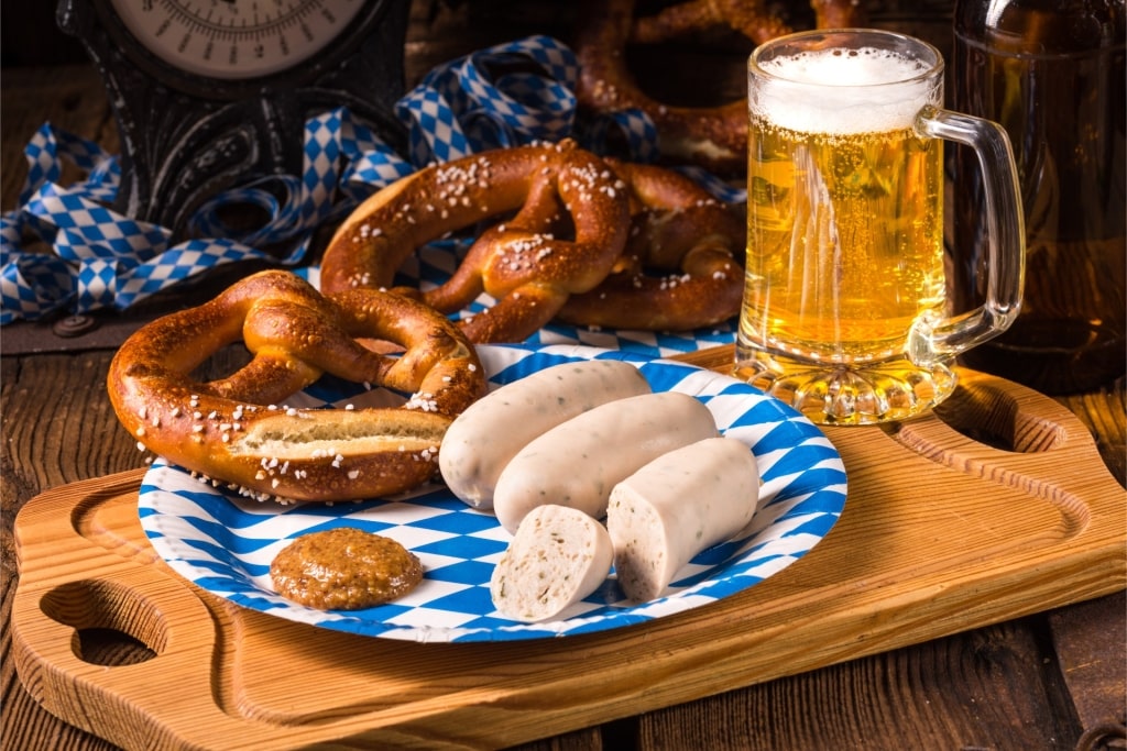Bavarian sausage with pretzel, sweet mustard and beer