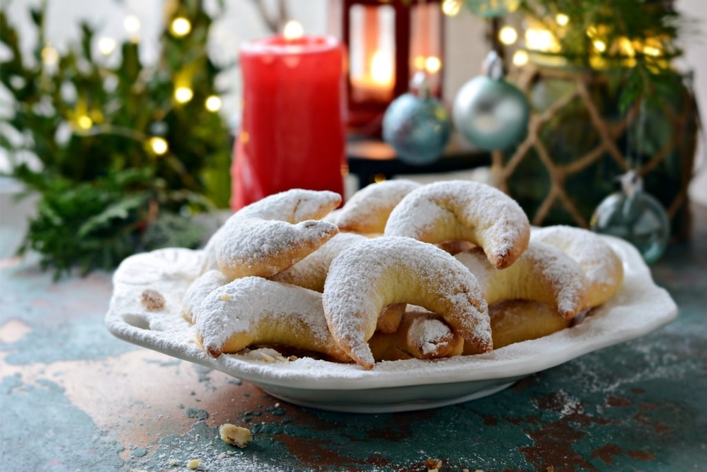 Traditional Vanillekipferl crescent-shaped vanilla cookies dusted with powdered sugar