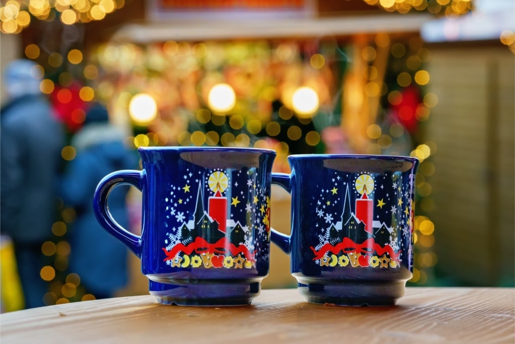 Hot Glühwein served in festive mugs at Christmas market