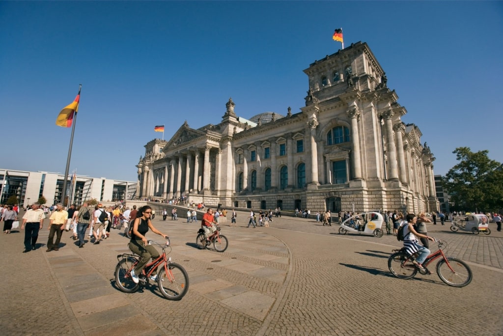 Tourists passing by the Parliament Building in Berlin