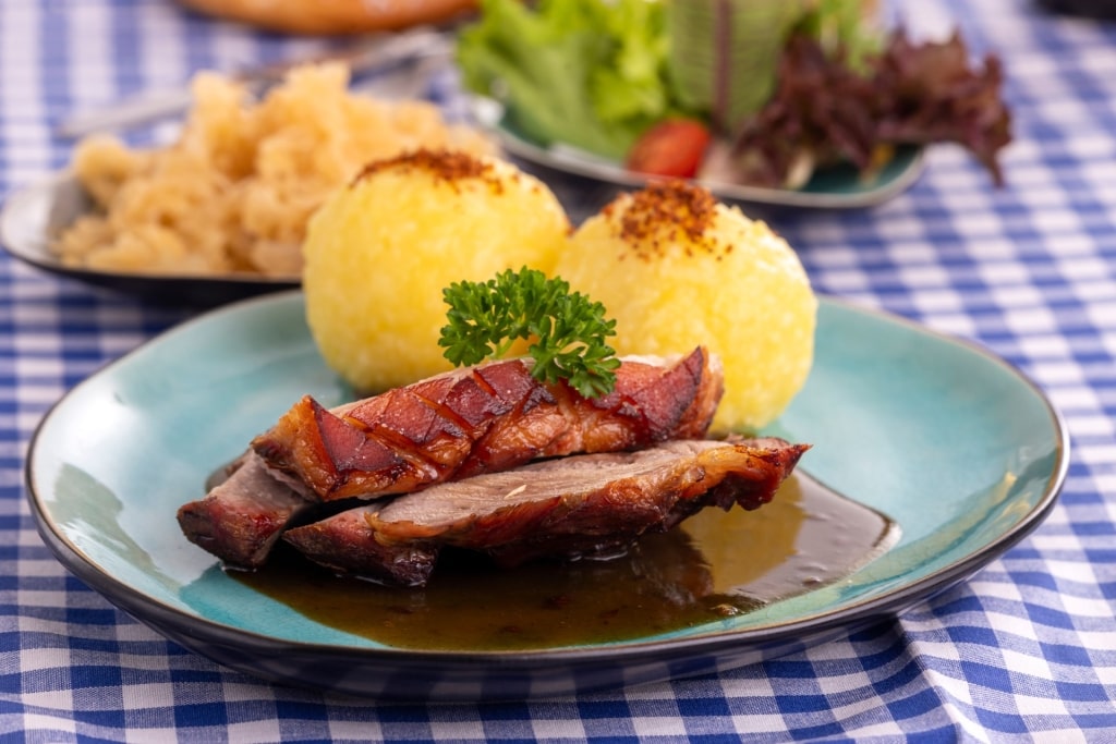 Roast pork dish Schweinebraten served with gravy