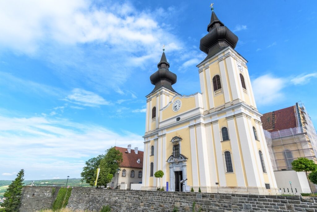 White and yellow facade of Maria Taferl Basilica