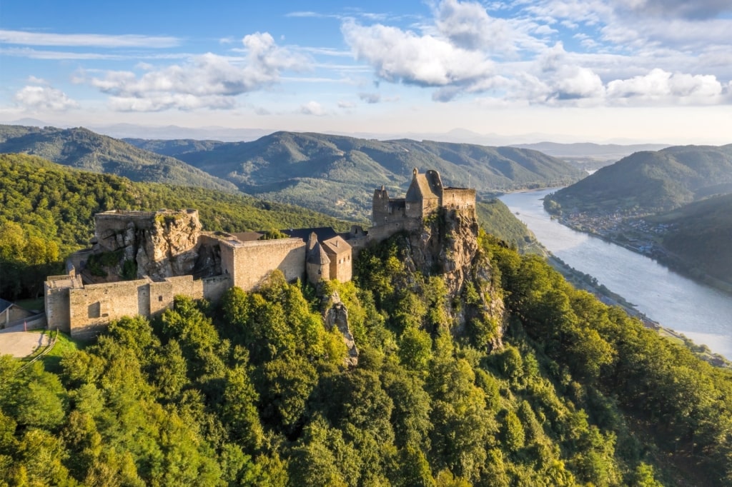 Aerial view of Aggstein Castle perched on a hill above the Danube River in Austria