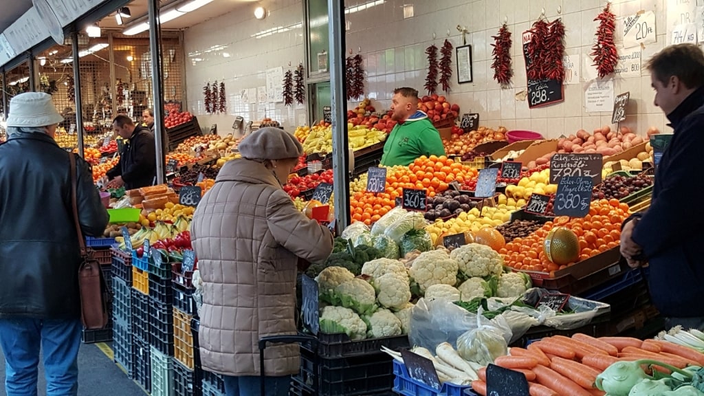 Colorful fresh produce displayed at Fény Utcai Christmas stalls