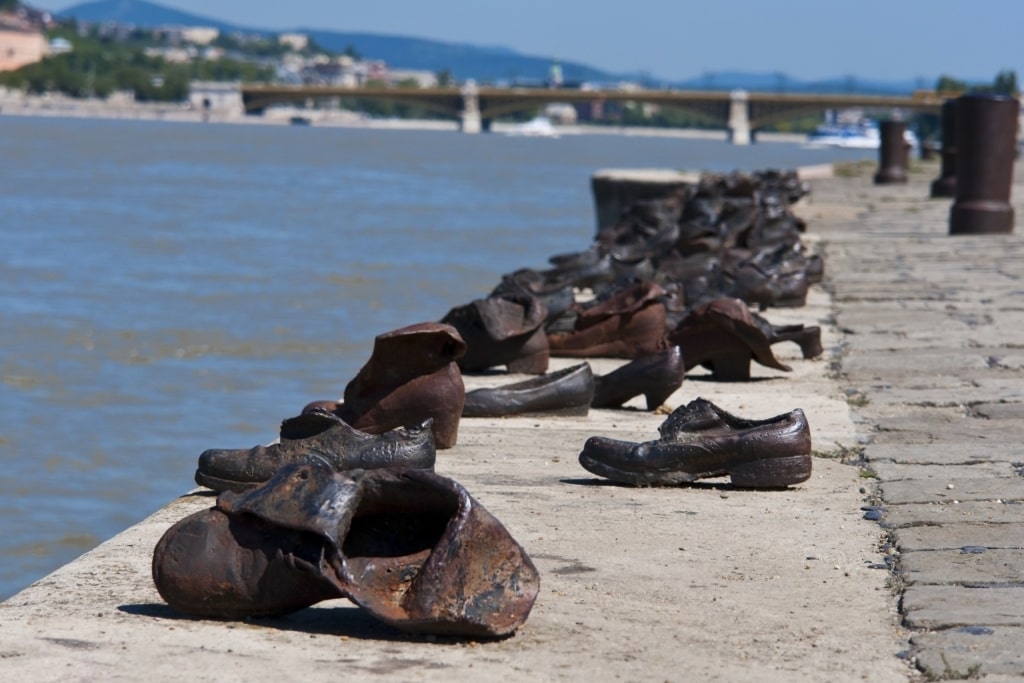 Iron shoe sculptures lined along the Danube River