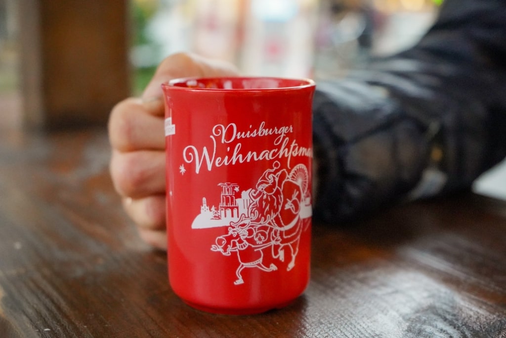 Hot Glühwein served in festive mug