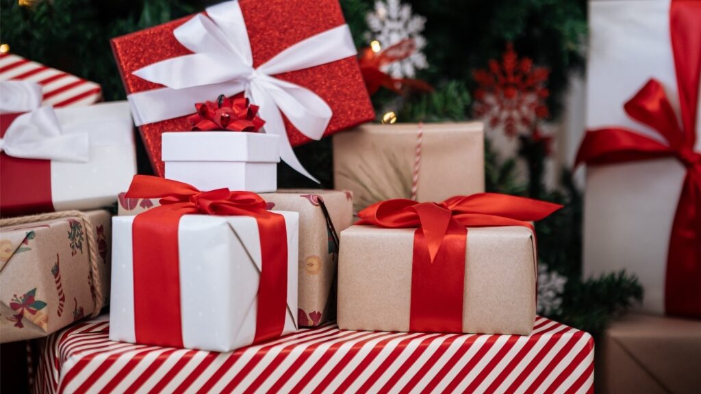 Holiday gifts under a Christmas tree