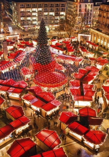Magical scene at the Cologne Christmas market with stalls lined up