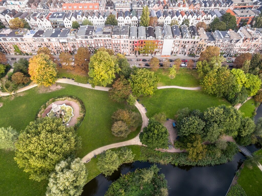 Aerial view of Sarphatipark with green lawns and walking paths in Amsterdam