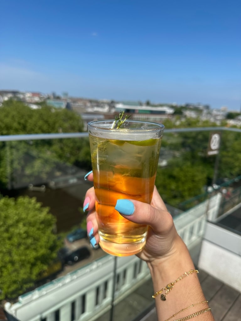 Glass of Heineken beer served at the Heineken Experience in De Pijp, Amsterdam