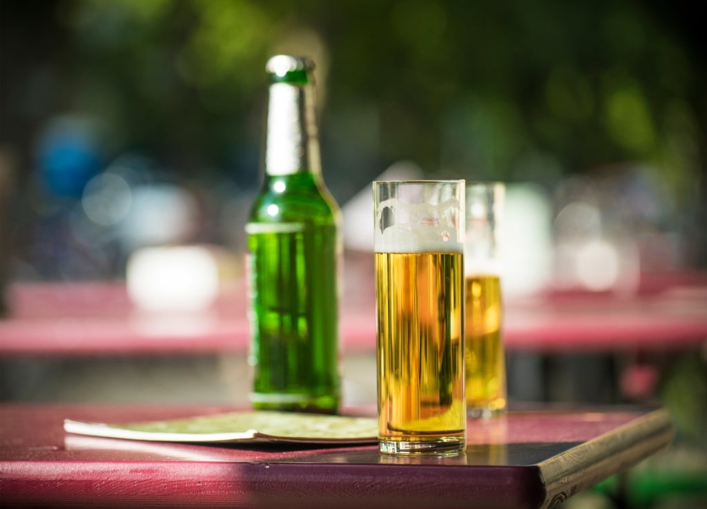 Refreshing Kölsch beer in traditional serving glasses and bottle