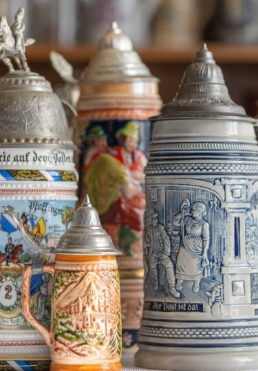 Traditional beer steins for sale as German souvenirs