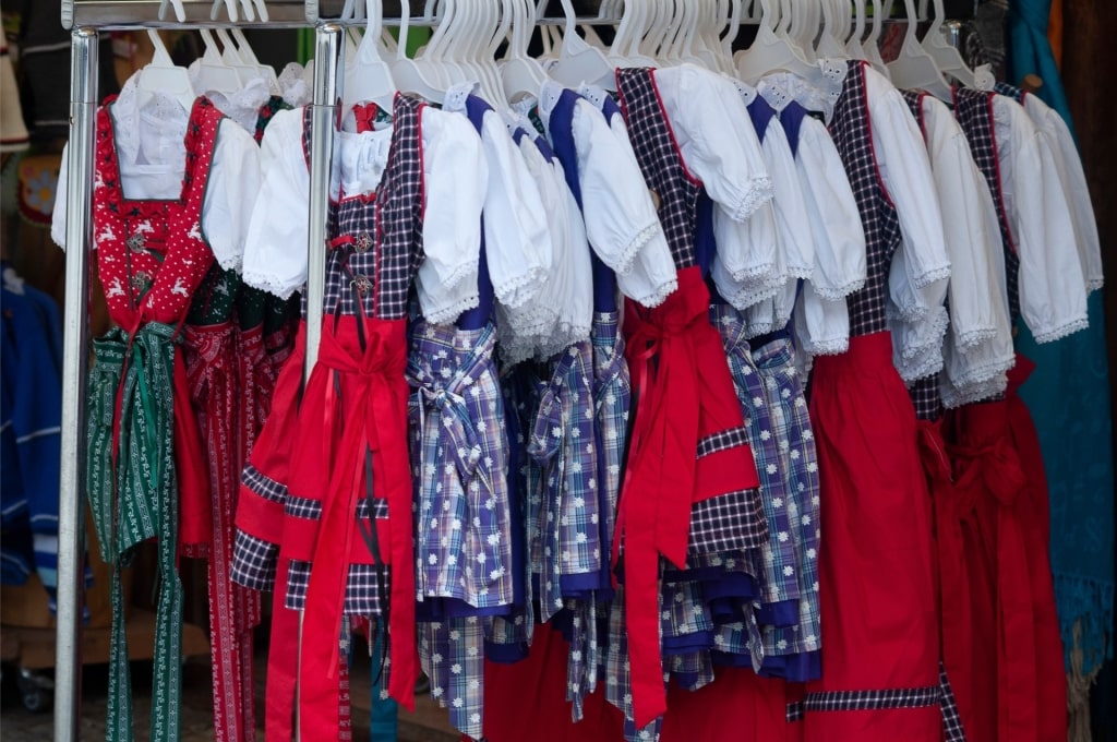 Traditional Bavarian dirndl dresses hanging on display