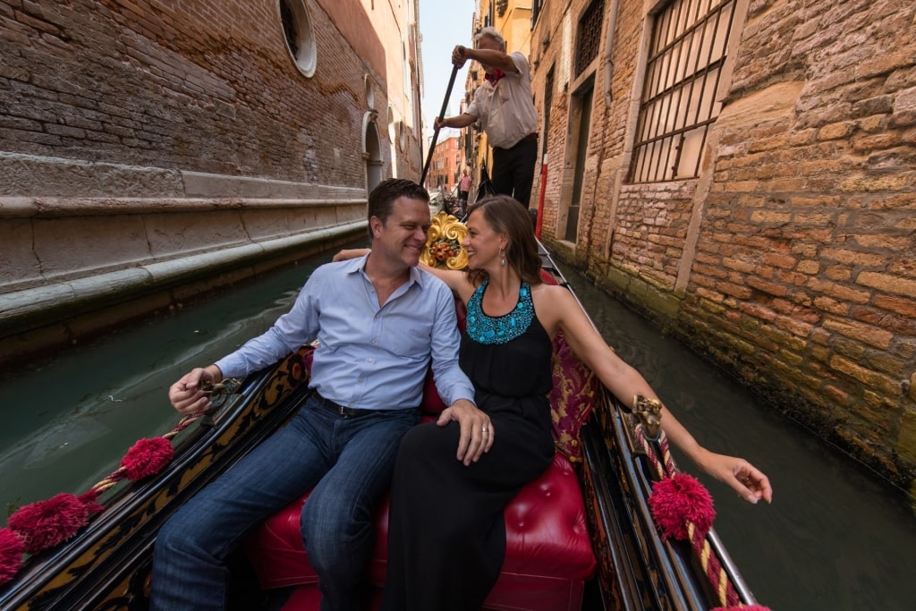 Couple on a gondola ride in Venice, Italy