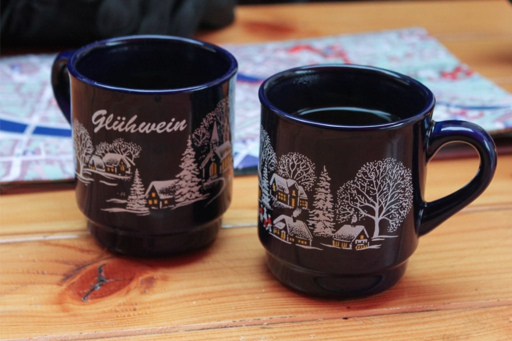 Traditional Glühwein mug filled with hot mulled wine