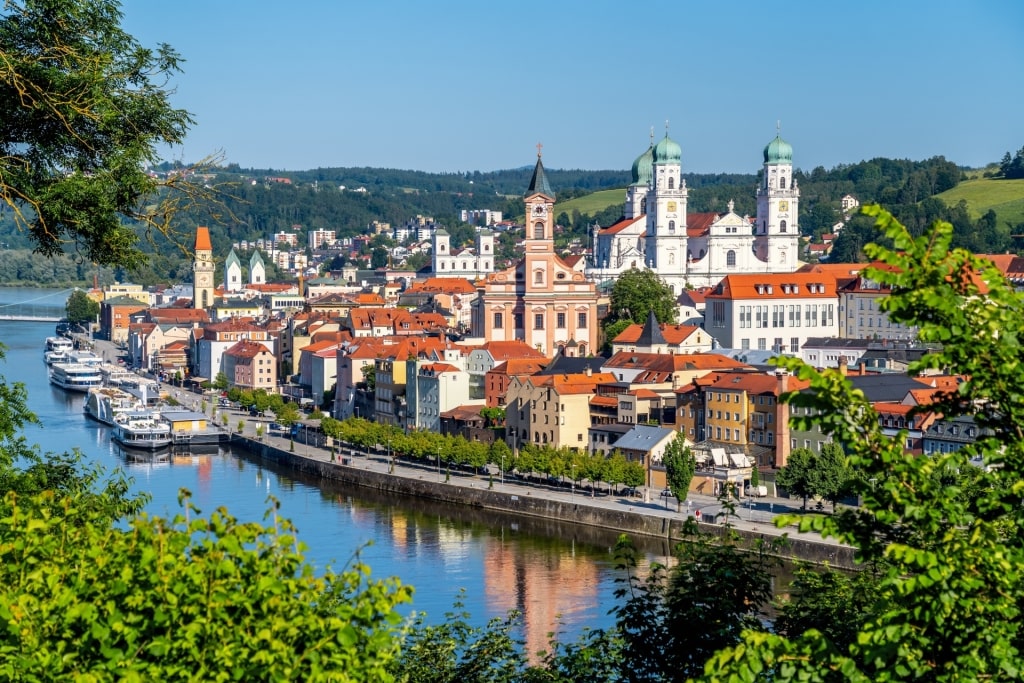 Scenic view of Passau, Germany along the Danube River with historic landmarks