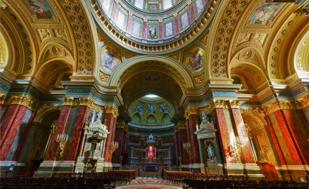 Inside St. Stephen’s Basilica with dome and altar in Budapest