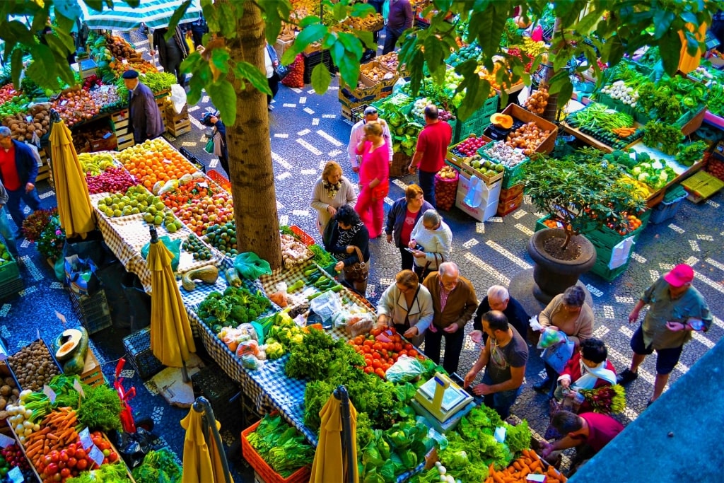 Busy Portuguese market with crowd of shoppers