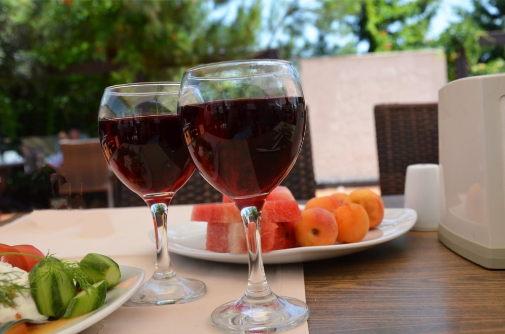 Traditional Portuguese Madeira wine in two glasses with fruits