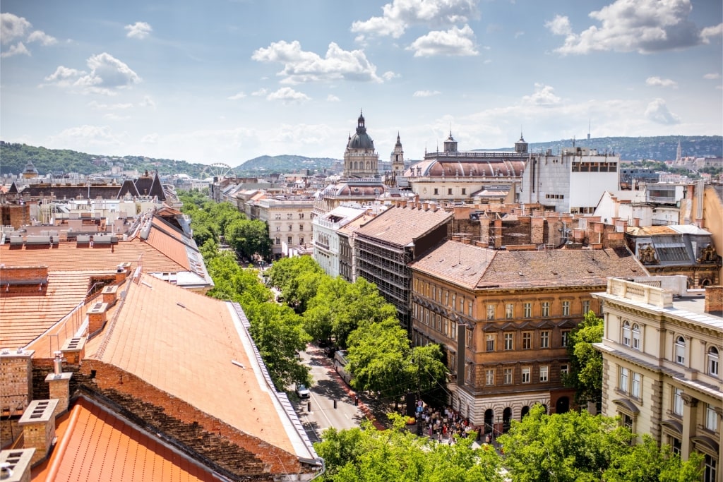 Aerial shot of Andrássy Avenue in Budapest with historic buildings and trees