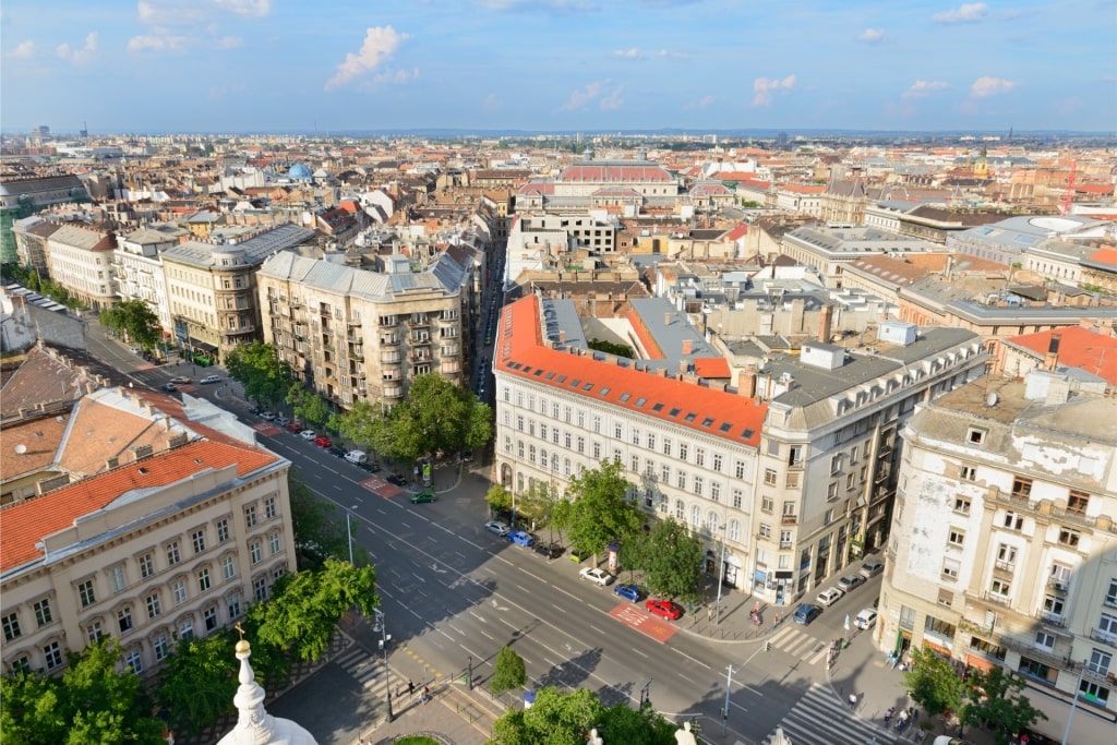 Aerial shot of Andrássy Avenue in Budapest with historic buildings and trees