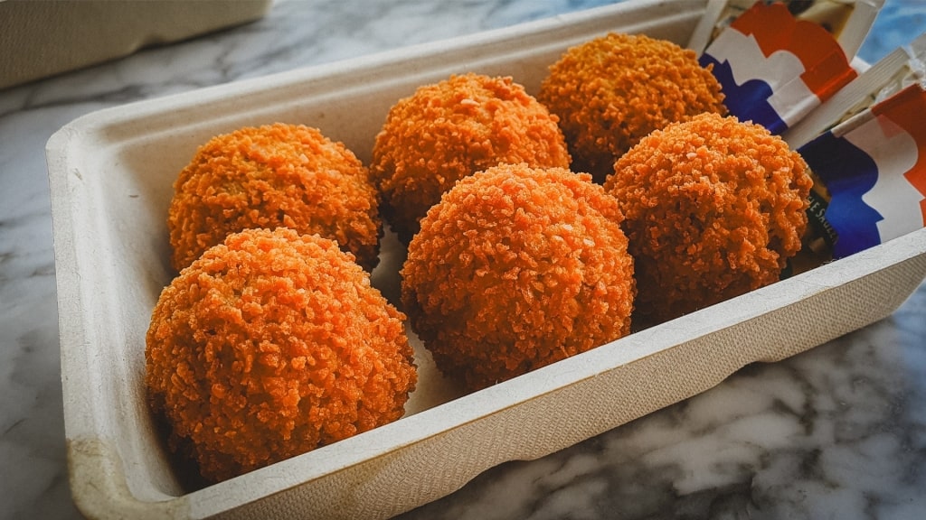 Cup of Dutch bitterballen meatballs at an Amsterdam street market