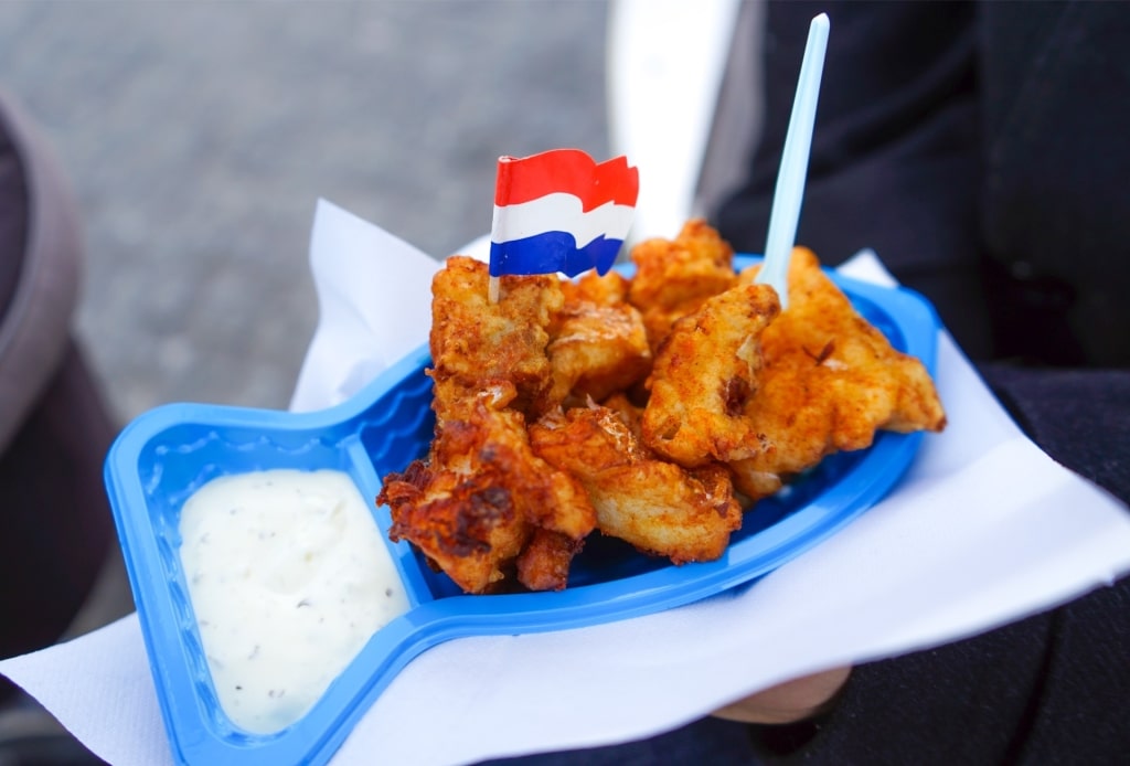 Traditional Dutch kibbeling served with garlic dipping sauce