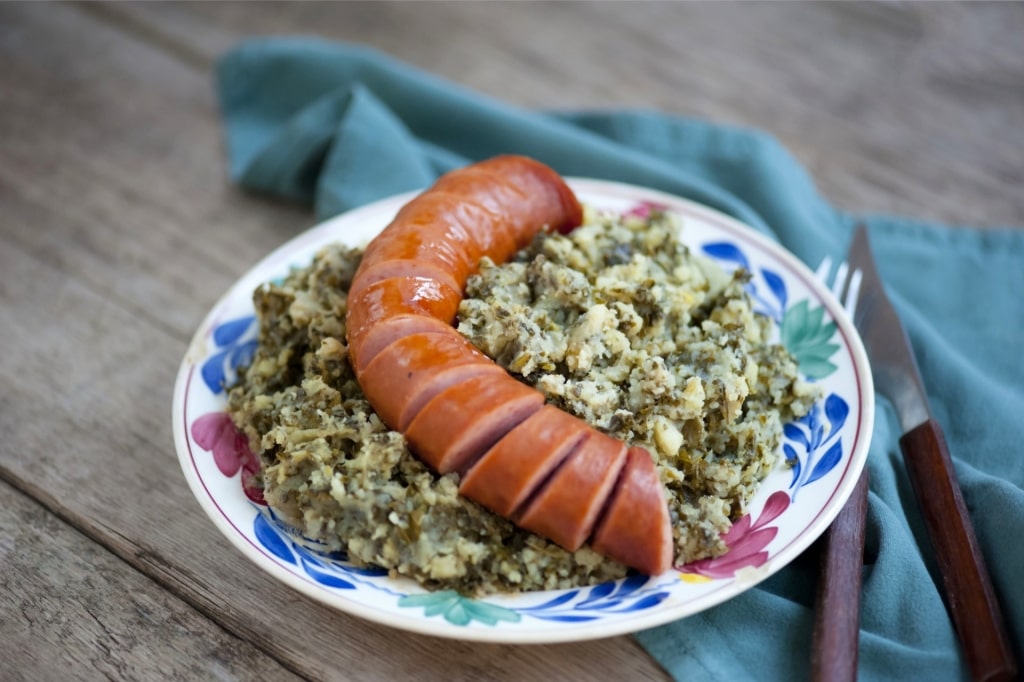 Traditional Dutch stamppot with mashed potatoes and kale
