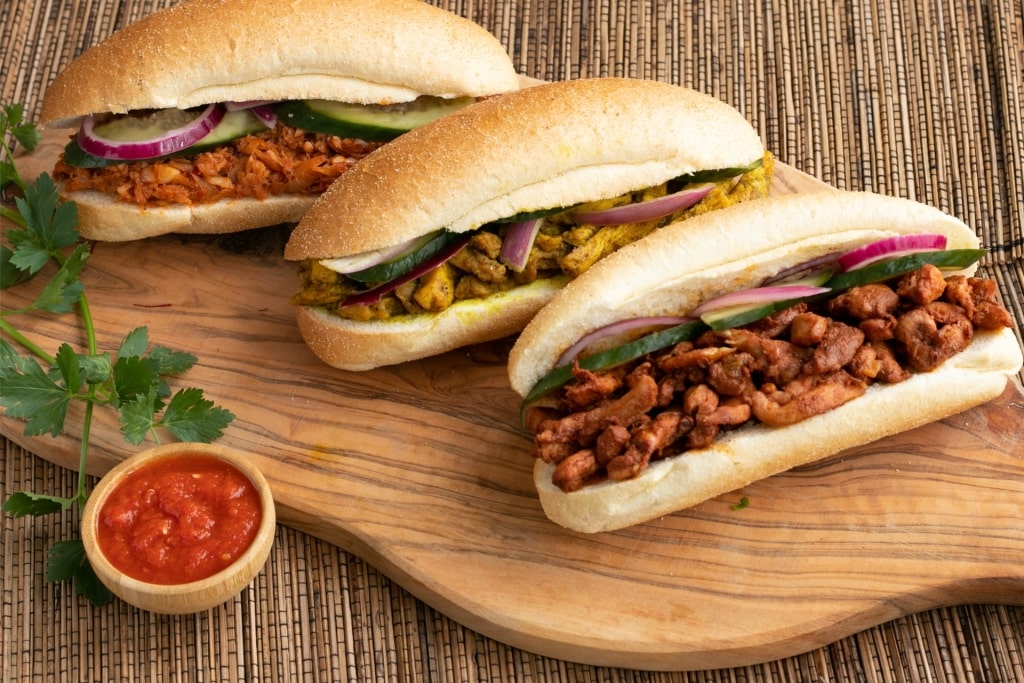 Traditional Surinamese broodje sandwich with spiced chicken filling