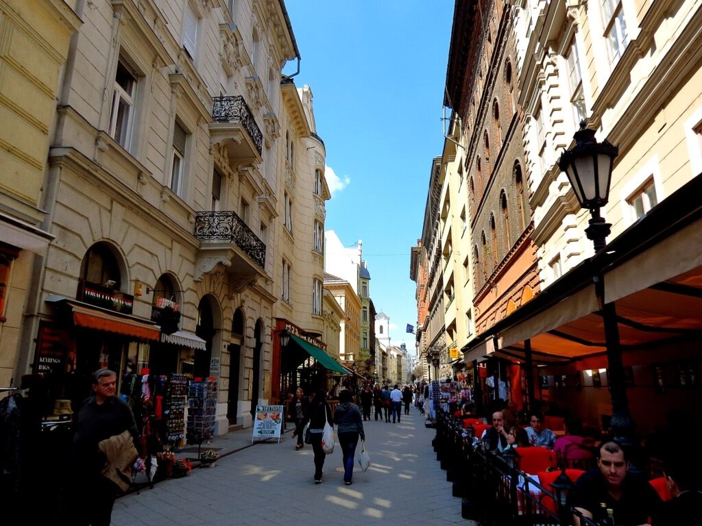 Váci Street buildings with shops, cafes, and historic design in Budapest