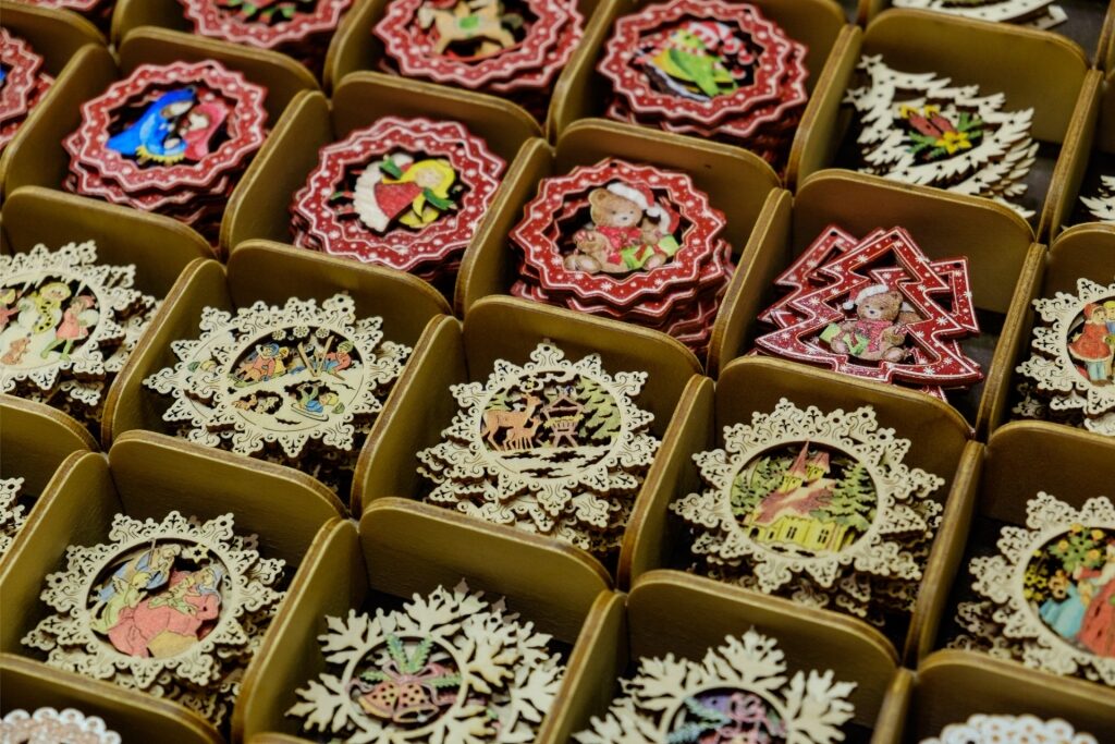 Handmade wooden holiday carvings at a Christmas market