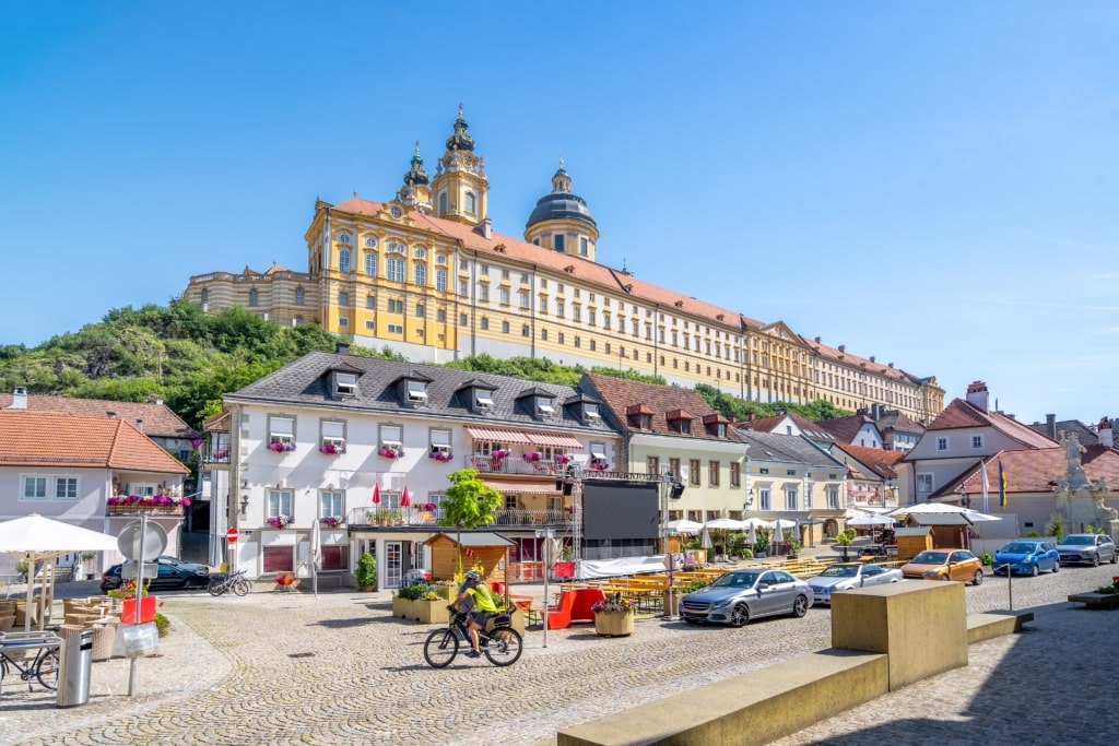 Street view of Melk with view of the abbey