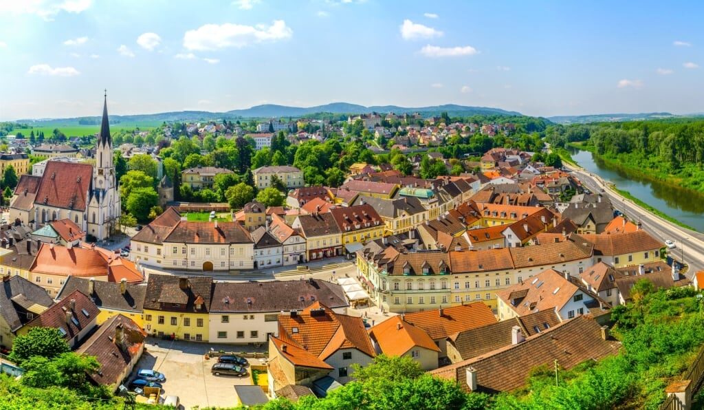 Quaint town of Melk with lush trees in Wachau Valley