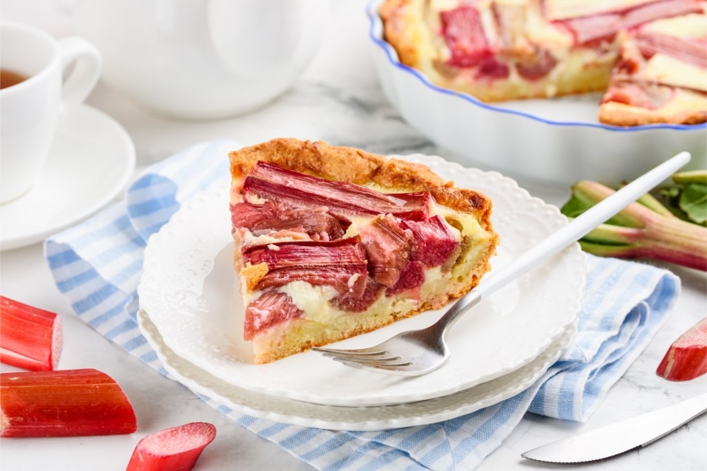 Classic French dessert Tarte à la Rhubarbe baked with seasonal rhubarb