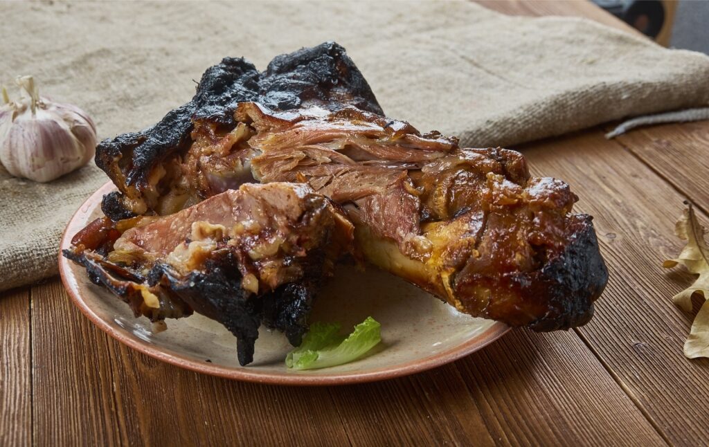 Salted pork knuckle Waedele on plate