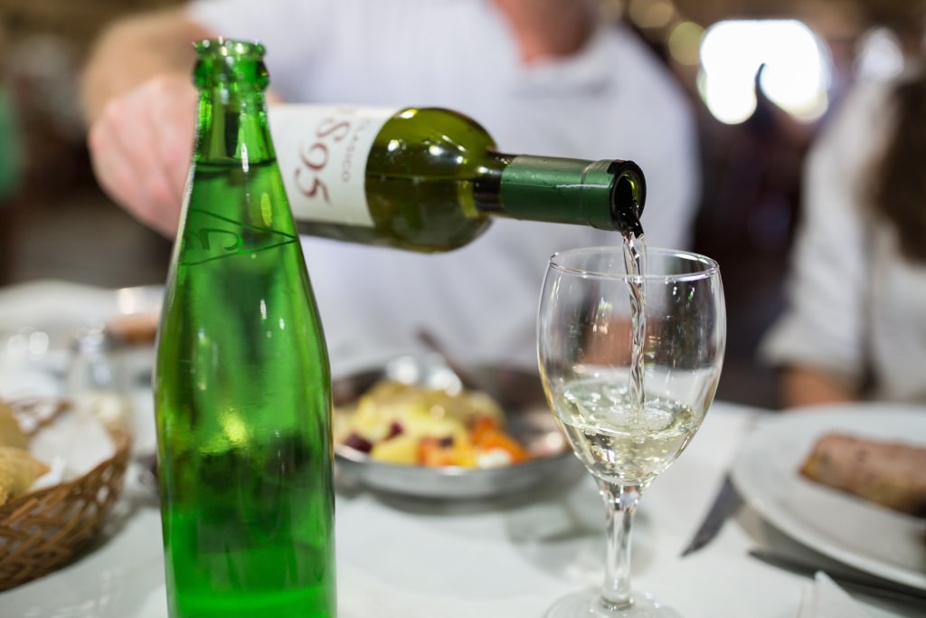 Pouring Argentine wine into a glass