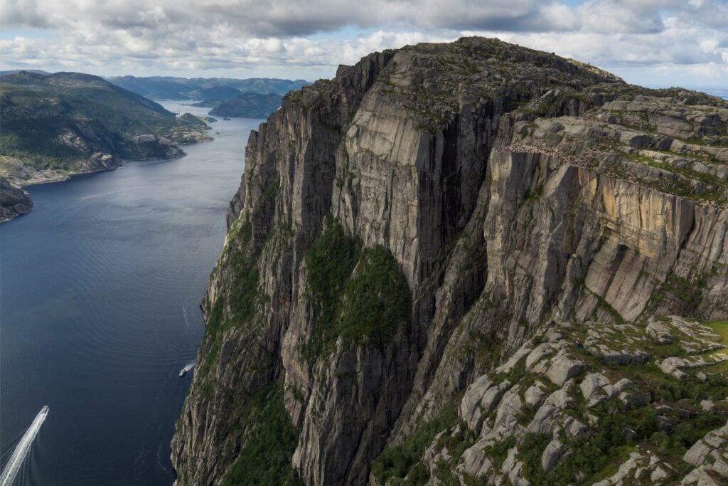 Scenic Lysefjord landscape with towering granite cliffs and calm fjord waters