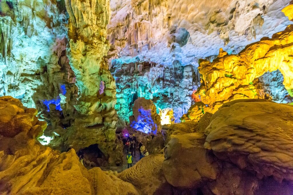 Illuminated stalactites inside Sung Sot Cave in Ha Long Bay, Vietnam