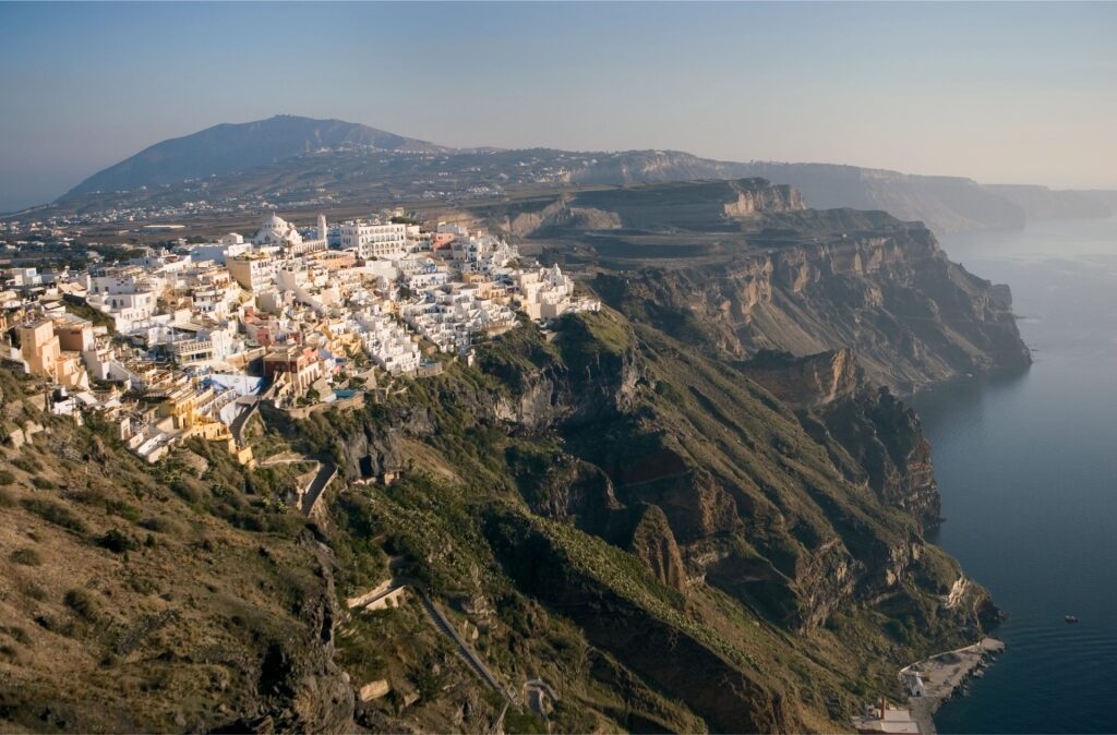 Scenic view of Fira’s whitewashed houses on the cliffs of Santorini, Greece