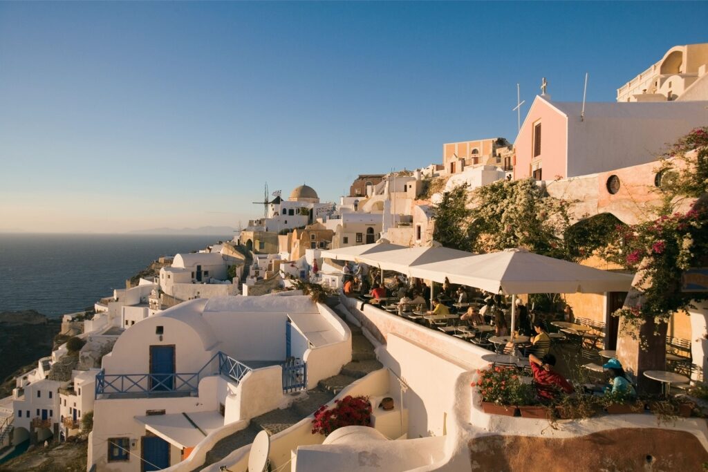 Scenic view of Oia village with white houses in Santorini, Greece