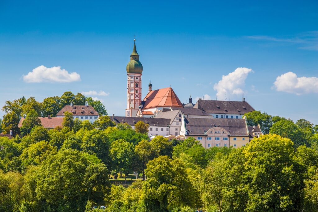 Beautiful landscape featuring Andechs Abbey surrounded by lush greenery in Germany