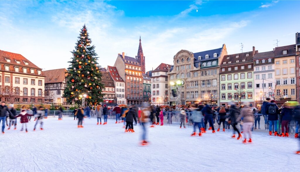 Winter ice skating scene near the Christmas market in Strasbourg, France