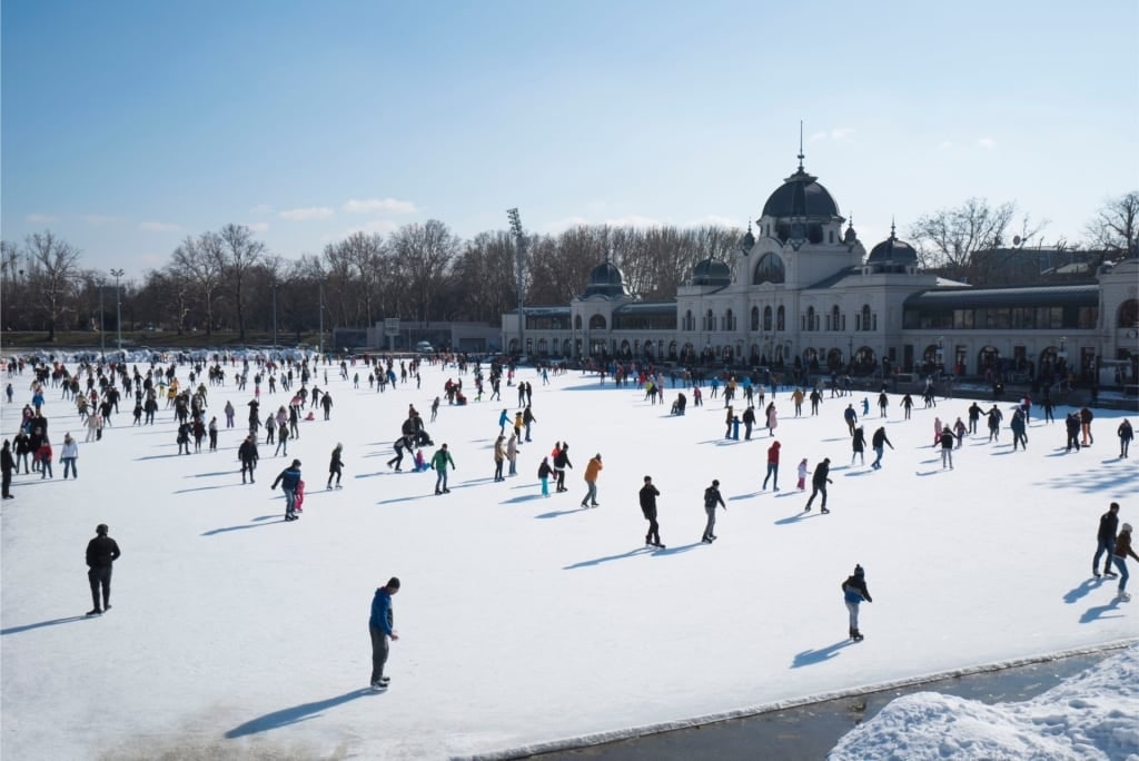 People ice skating at City Park Ice Rink in Budapest, Hungary